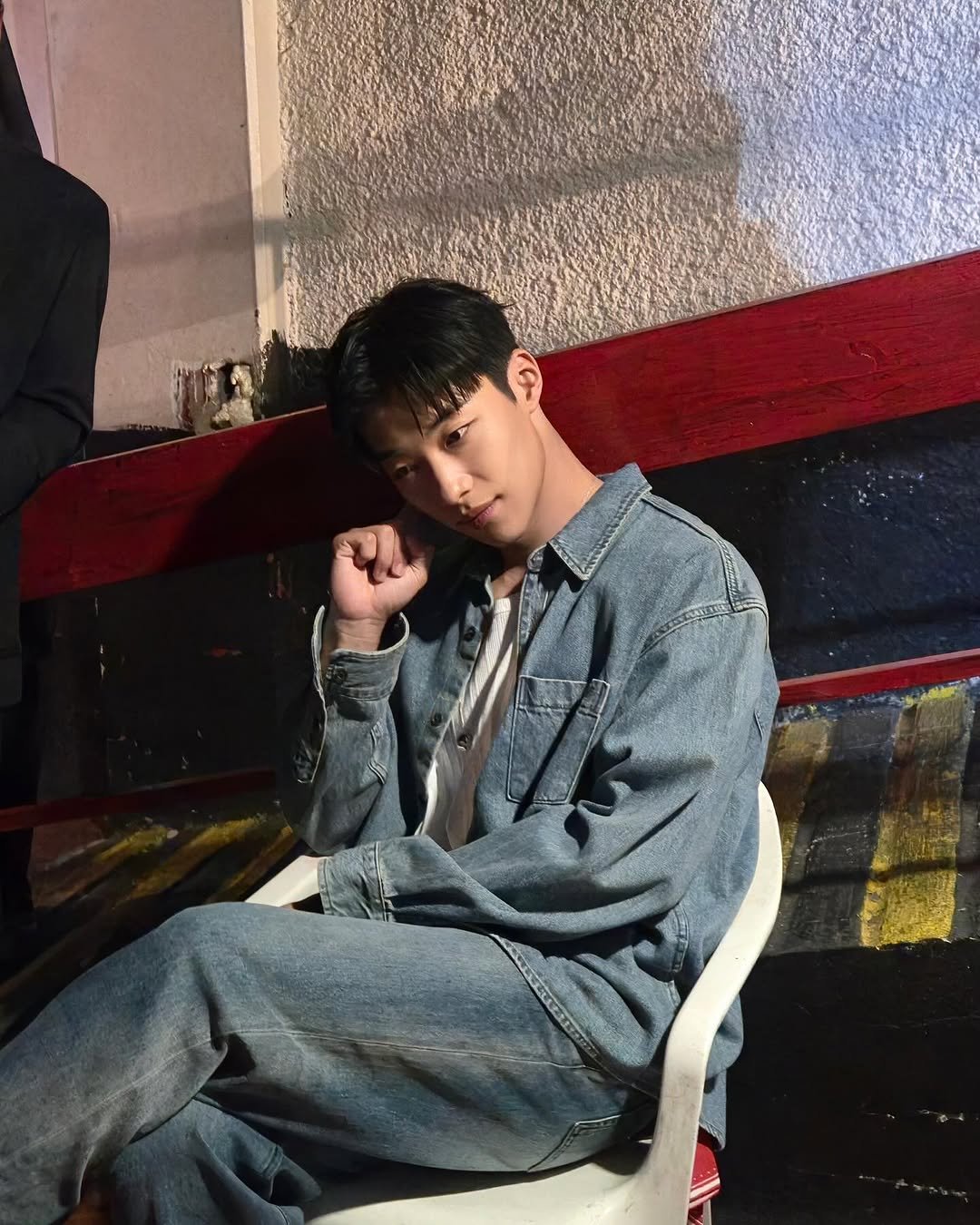 Photo by 우도환 on August 14, 2025. May be an image of 1 person, wingtip shoes, bolo tie and text.