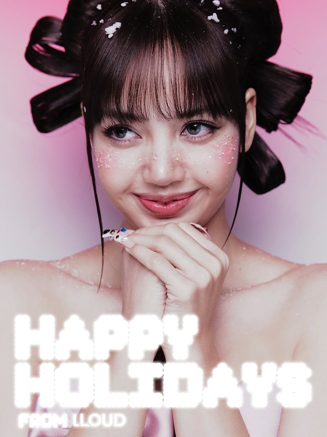 Photo shared by LLOUD on December 24, 2025 tagging @lalalalisa_m. May be an image of one or more people, bangs, makeup, poster, magazine, tinsel and text that says 'HAPPy HOLIDAYS DAYS HOLI FROM,LLOUD LLOUD'.