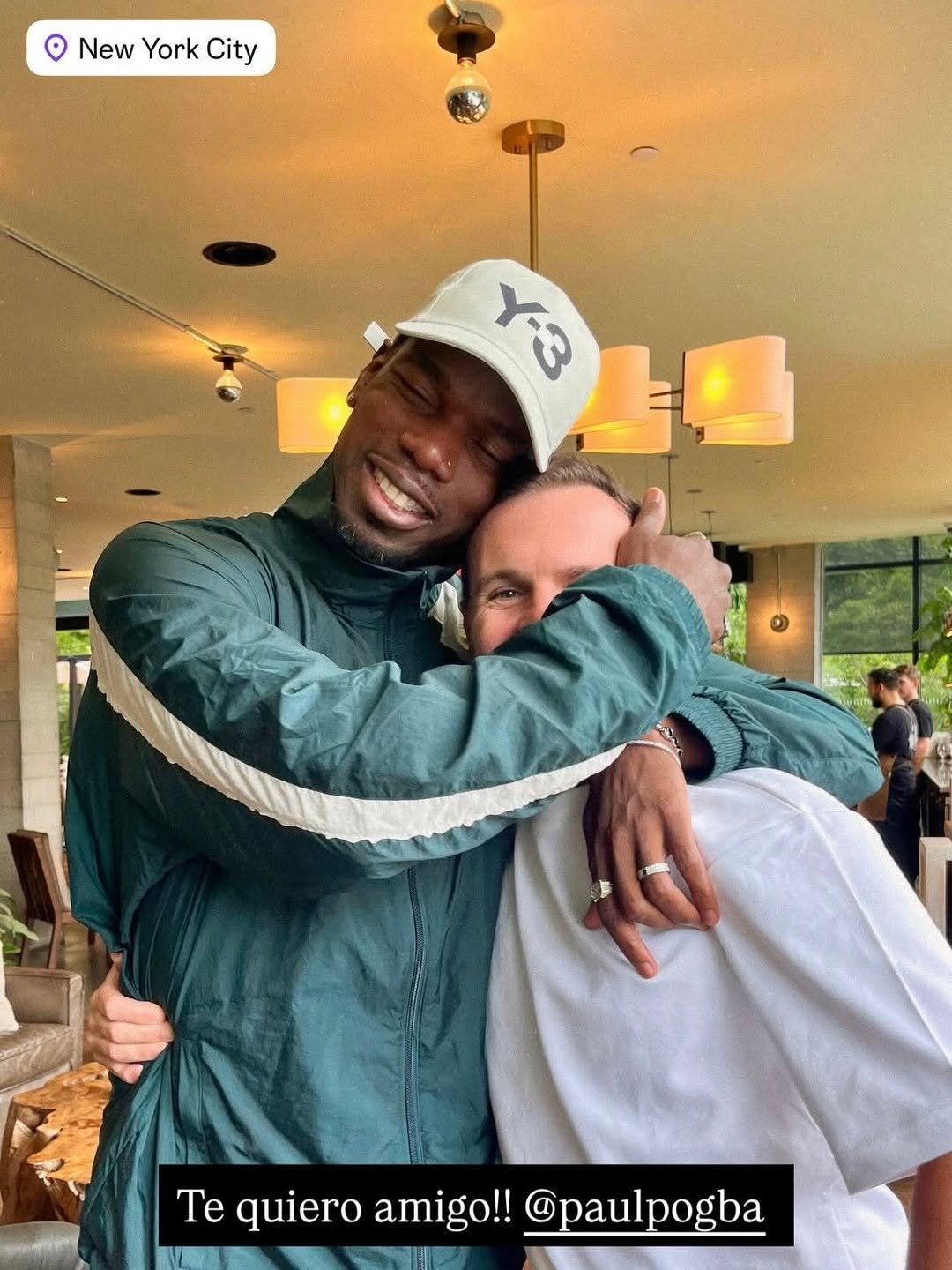 Paul Pogba and Juan Mata embrace in New York City at the World Cup.