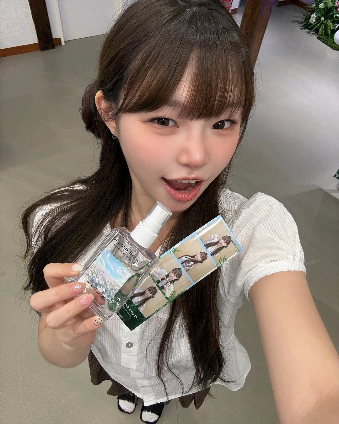Photo shared by 위히 on August 09, 2025 tagging @roundaround_official. May be an image of 1 person, dental floss, hand cream, ointment and text.
