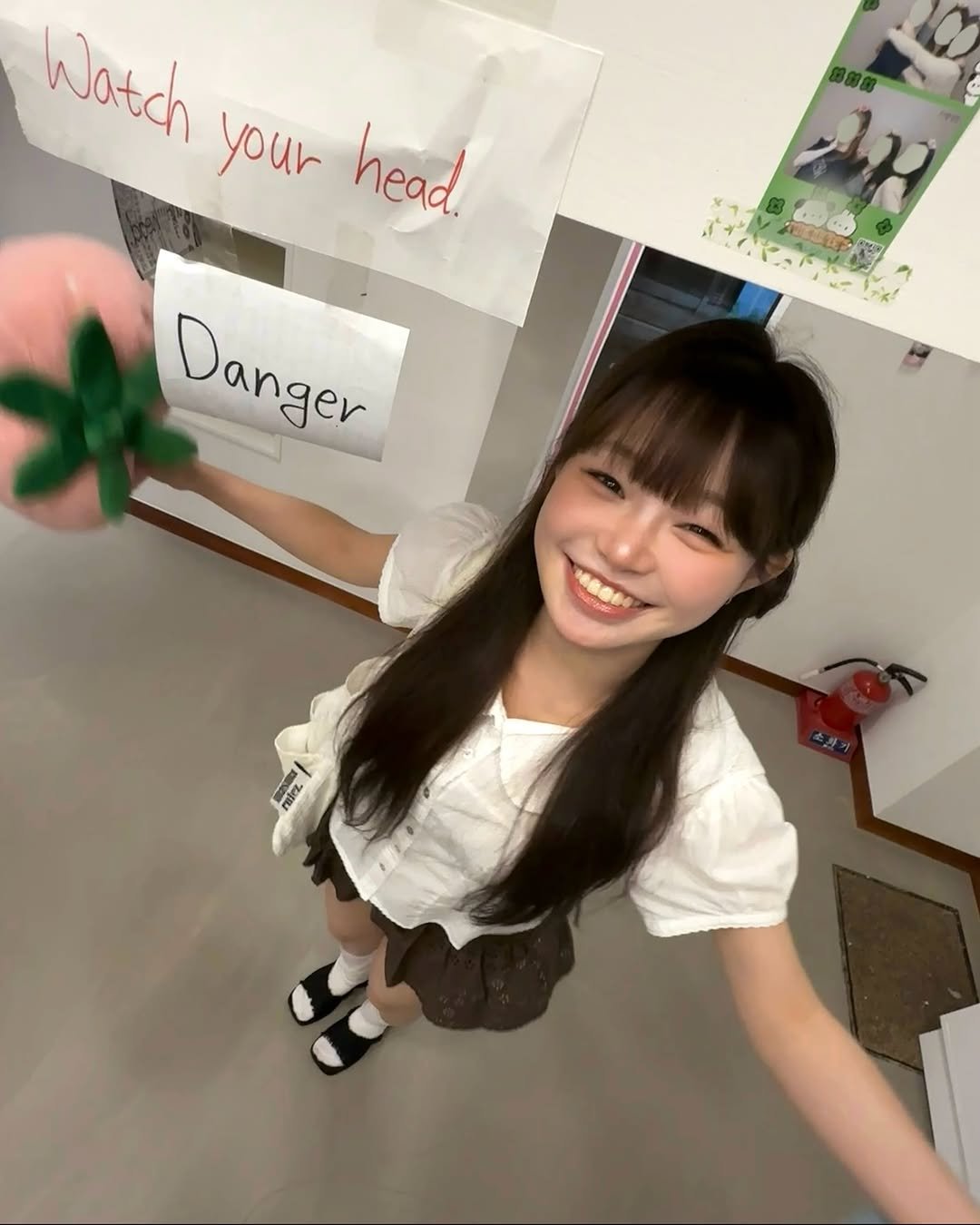 Photo by 위히 on August 22, 2025. May be an image of ‎1 person, bangs and ‎text that says '‎Watch your head و ه N 1 Danger ralez‎'‎‎.