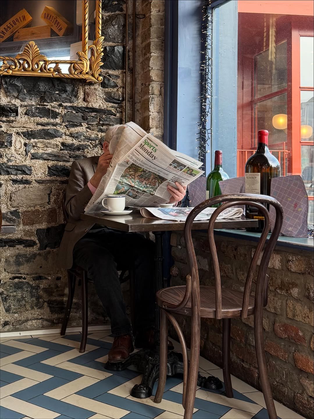 Photo by 웰컴준 𝗜 김유정 on November 12, 2025. May be an image of newspaper, indoors, brick wall and text.