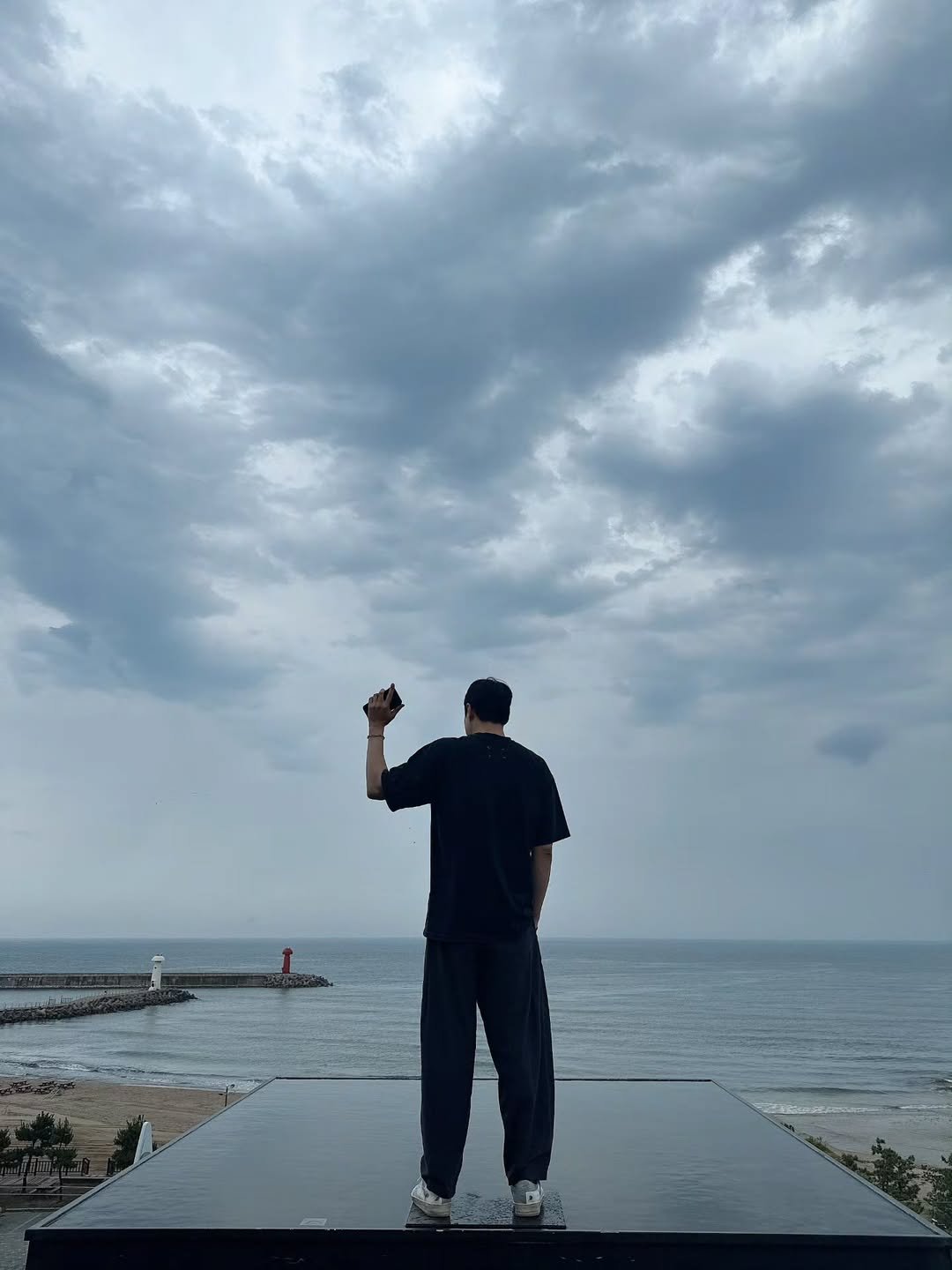 Photo by 최대학 on July 26, 2025. May be an image of 1 person, standing, tornado, cloud, horizon and text.