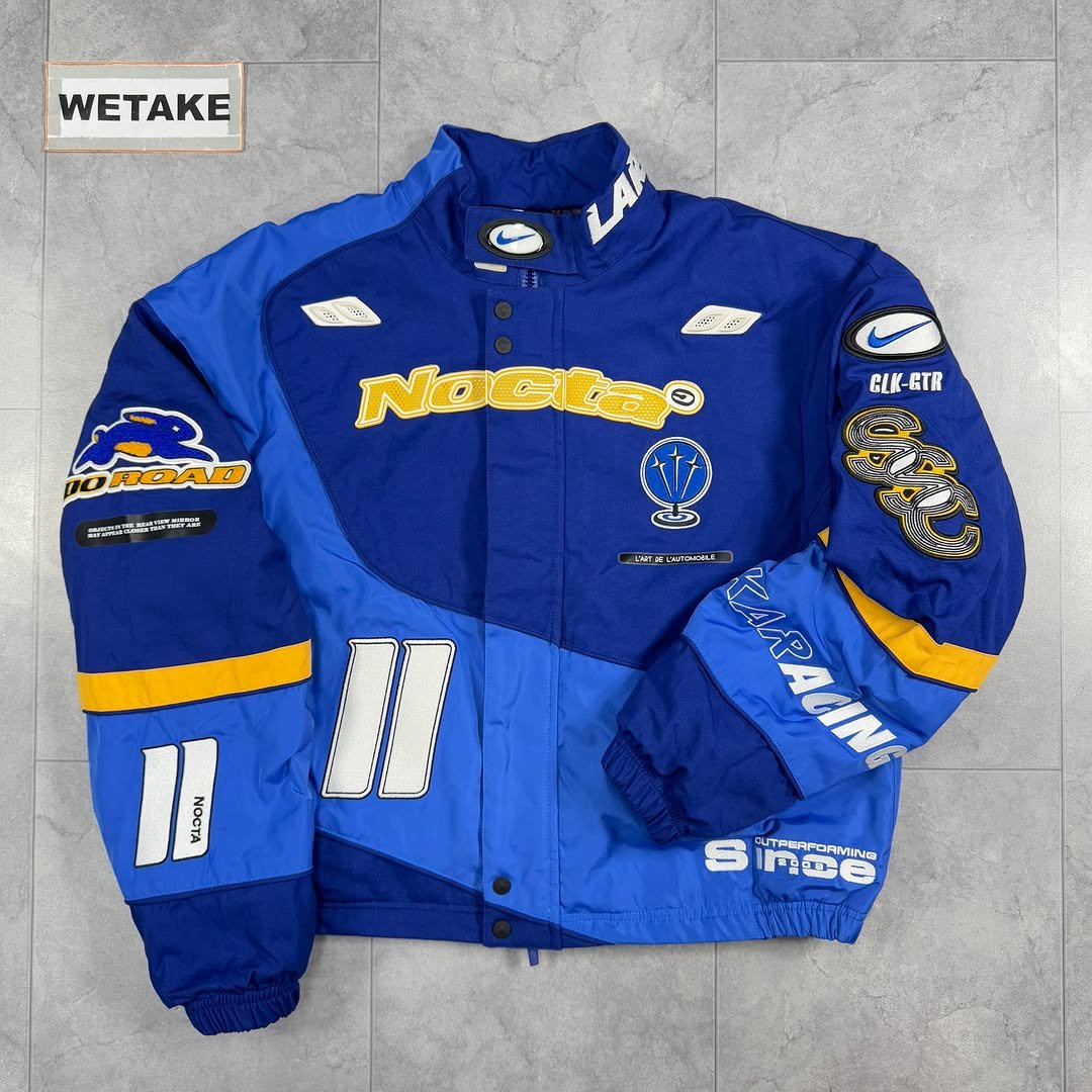 Photo by 위탁빈티지 on November 22, 2025. May be an image of racing vehicles, jacket, parka, sportswear and text.