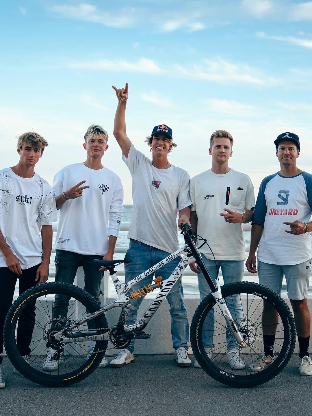 Photo shared by Fabio Wibmer on August 29, 2025 tagging @mariusprell, @hannesberger_com, @max_kuntze, and @alex_schoell. May be an image of 5 people, bicycle and text.