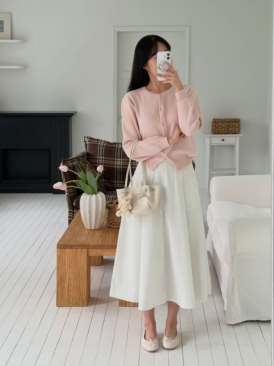 Photo by 윈미룸winmiroom on March 26, 2026. May be an image of dress, skirt and text.