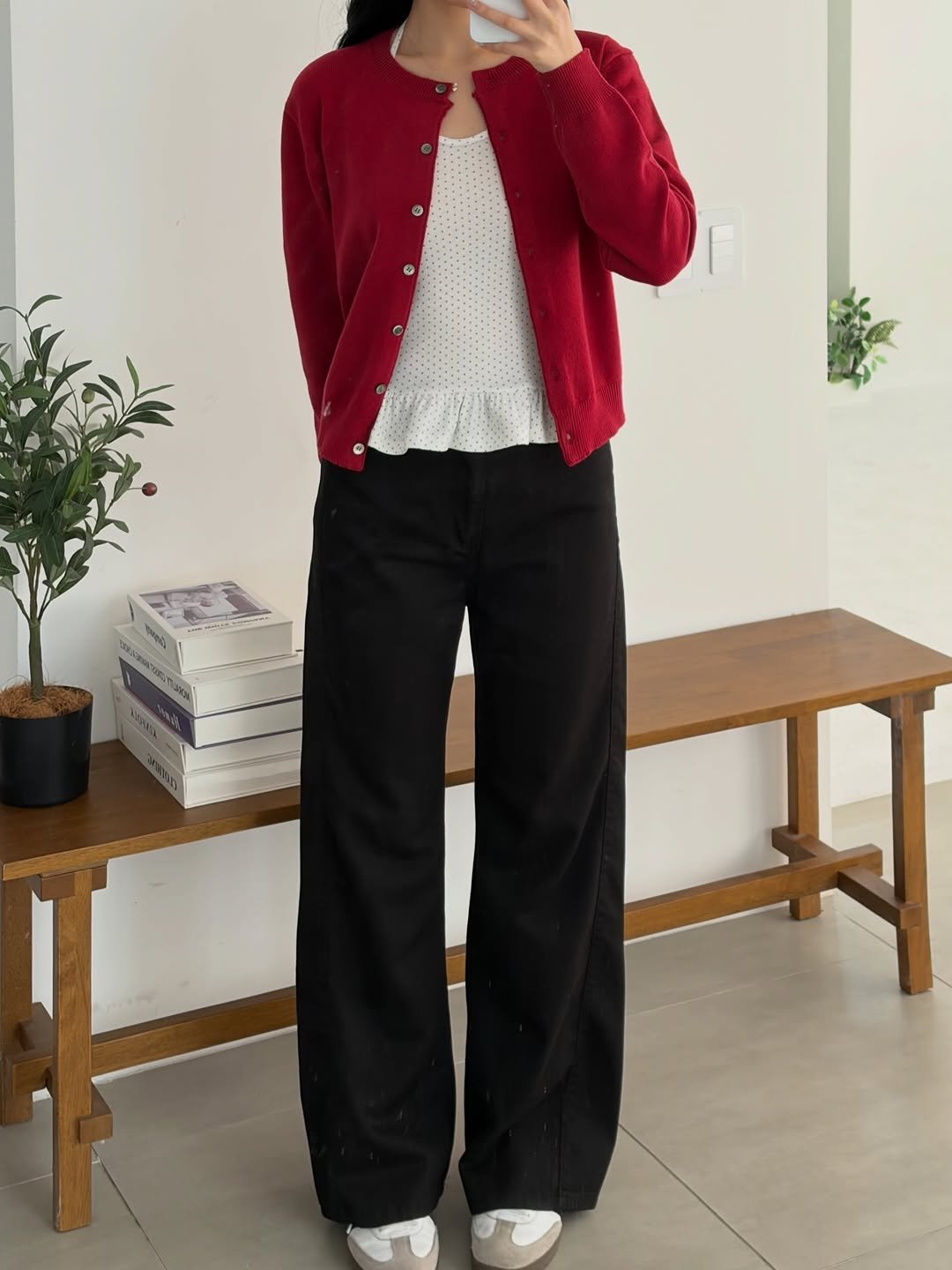 Photo by 윈미룸winmiroom on March 02, 2026. May be an image of coat, cardigan, blazer, top and text.