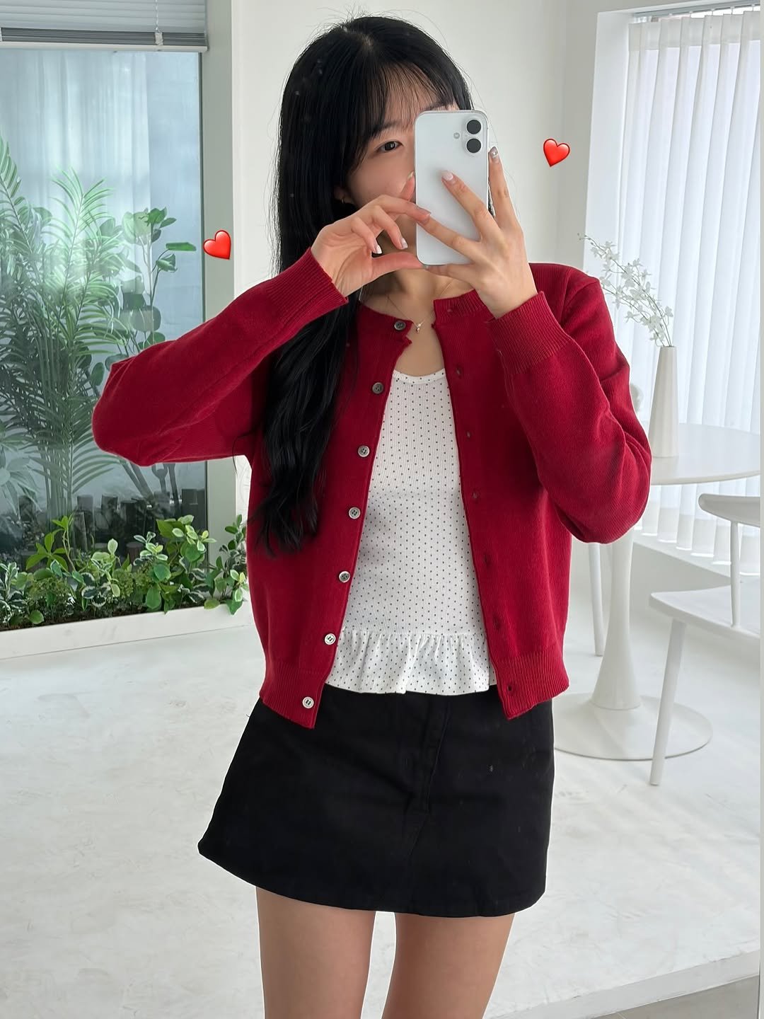 Photo shared by 윈미룸winmiroom on February 11, 2026 tagging @the_lalila. May be an image of jacket, cardigan, miniskirt, skirt, top, blazer and text.