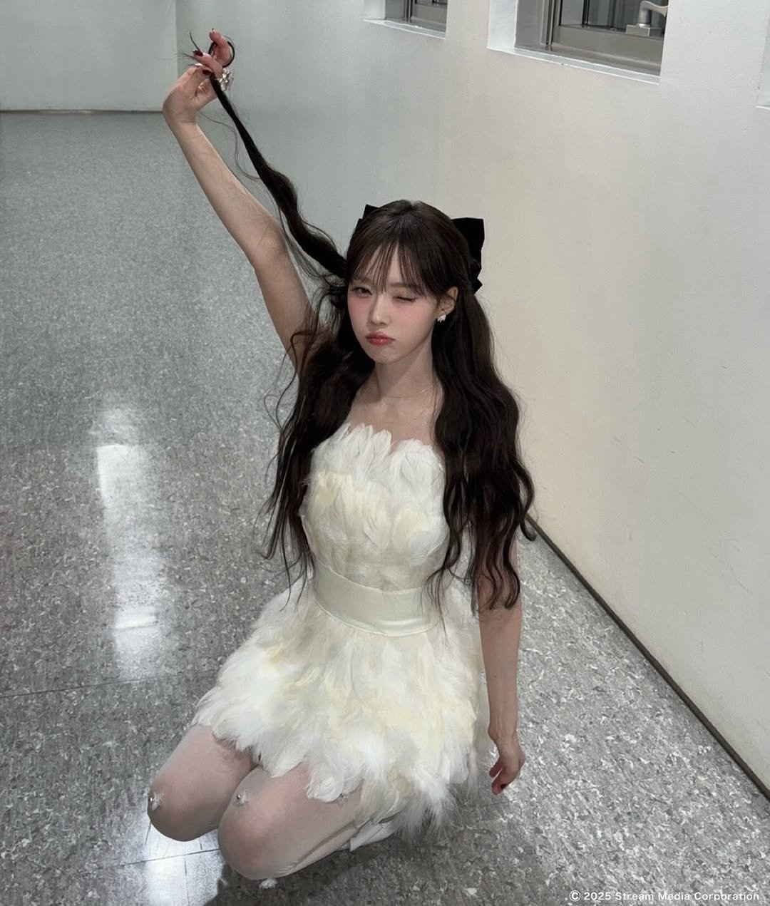 Photo shared by aespa 에스파 WINTER 윈터 on July 29, 2025 tagging @aespa_official, and @imwinter. May be an image of 1 person, hair, costume and text.