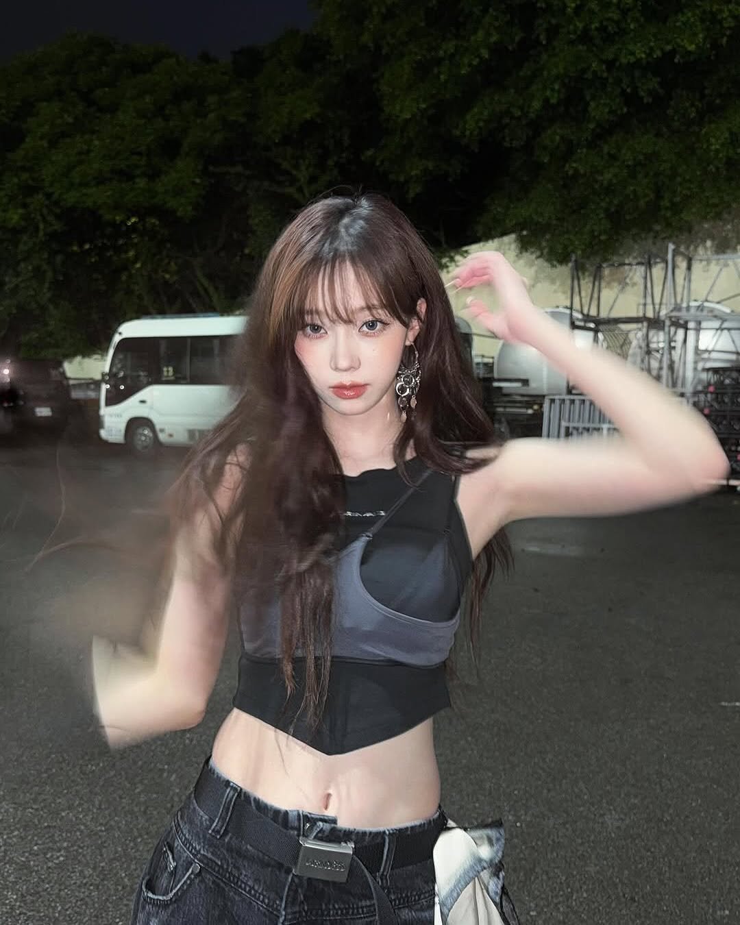 Photo shared by aespa 에스파 WINTER 윈터 on July 20, 2025 tagging @aespa_official, and @imwinter. May be an image of 1 person, hair, top and text.