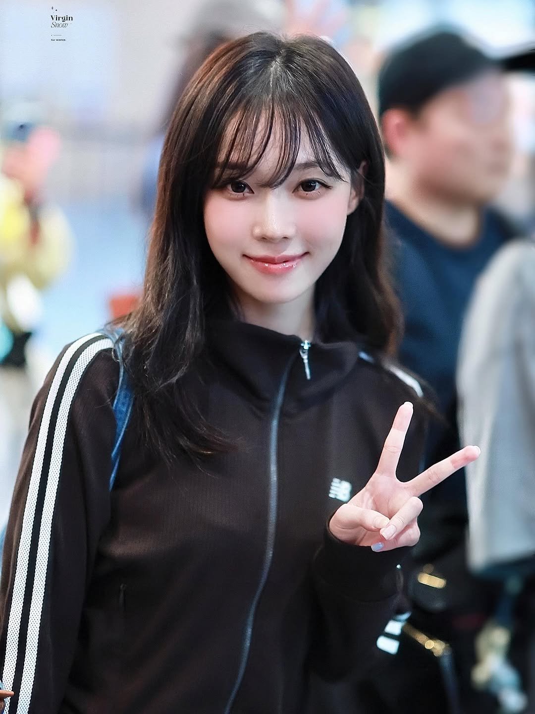 Photo shared by aespa 에스파 WINTER 윈터 on August 13, 2025 tagging @aespa_official, and @imwinter. May be an image of 1 person, bangs, top and text.