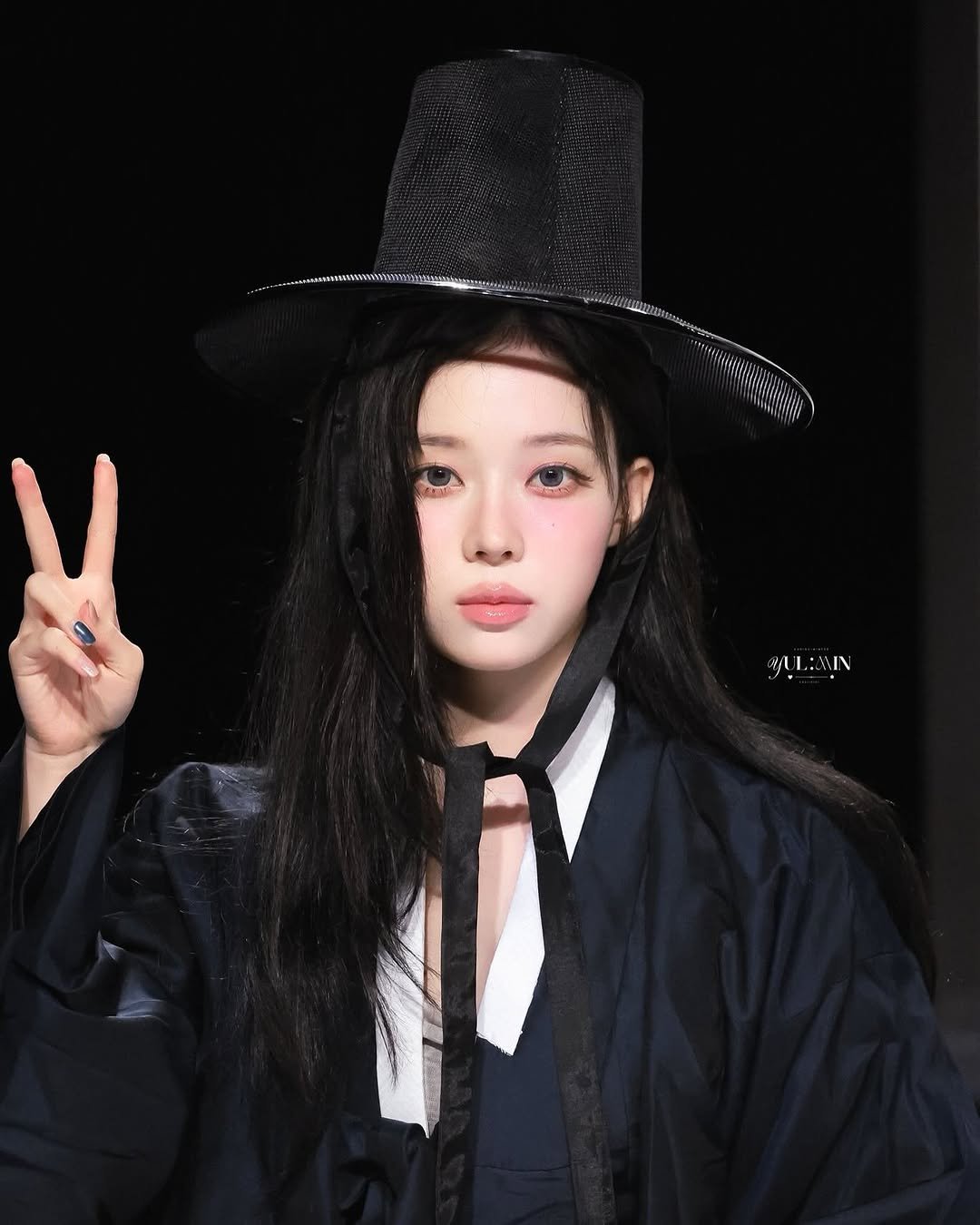 Photo shared by aespa 에스파 WINTER 윈터 on July 18, 2025 tagging @aespa_official, and @imwinter. May be an image of 1 person, hair, hat, beret, costume, bolo tie, bowler hat and text.