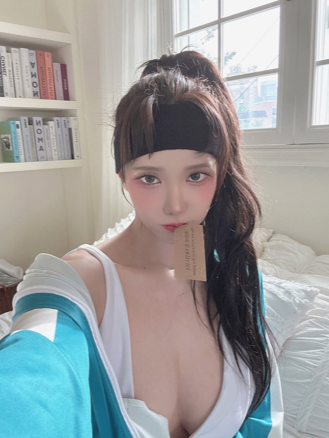 Photo by 겨우디 kyul on August 08, 2025. May be an image of 1 person, hair, bath robe, costume and text.