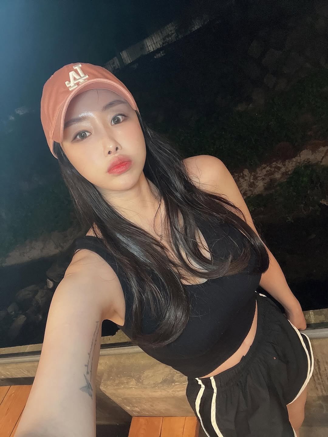Photo by 김 서영 (김매력) on August 14, 2025. May be a selfie of 1 person, hair, hat, top, shorts, outdoors and text that says 'A'.