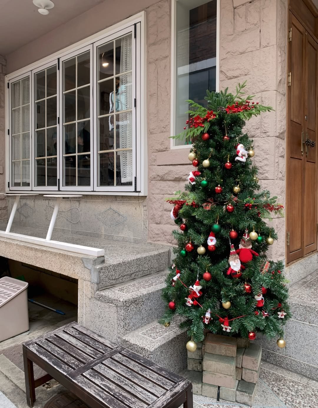 Photo shared by 예린 on January 03, 2026 tagging @witwins_seoul. May be an image of christmas tree, tinsel, window box, window and text.