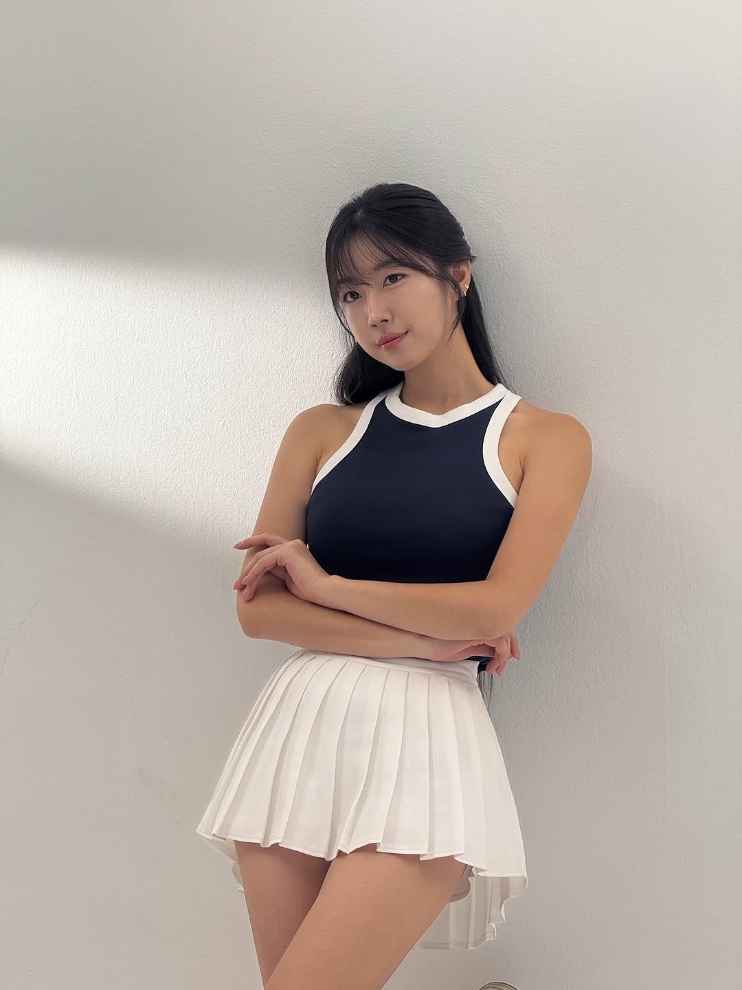 Photo by 안지현🇰🇷 ♯₁|Ji Hyun An|安芝儇 ♯₂ 🐷 on July 27, 2025. May be an image of 1 person, miniskirt, skirt, top and text.