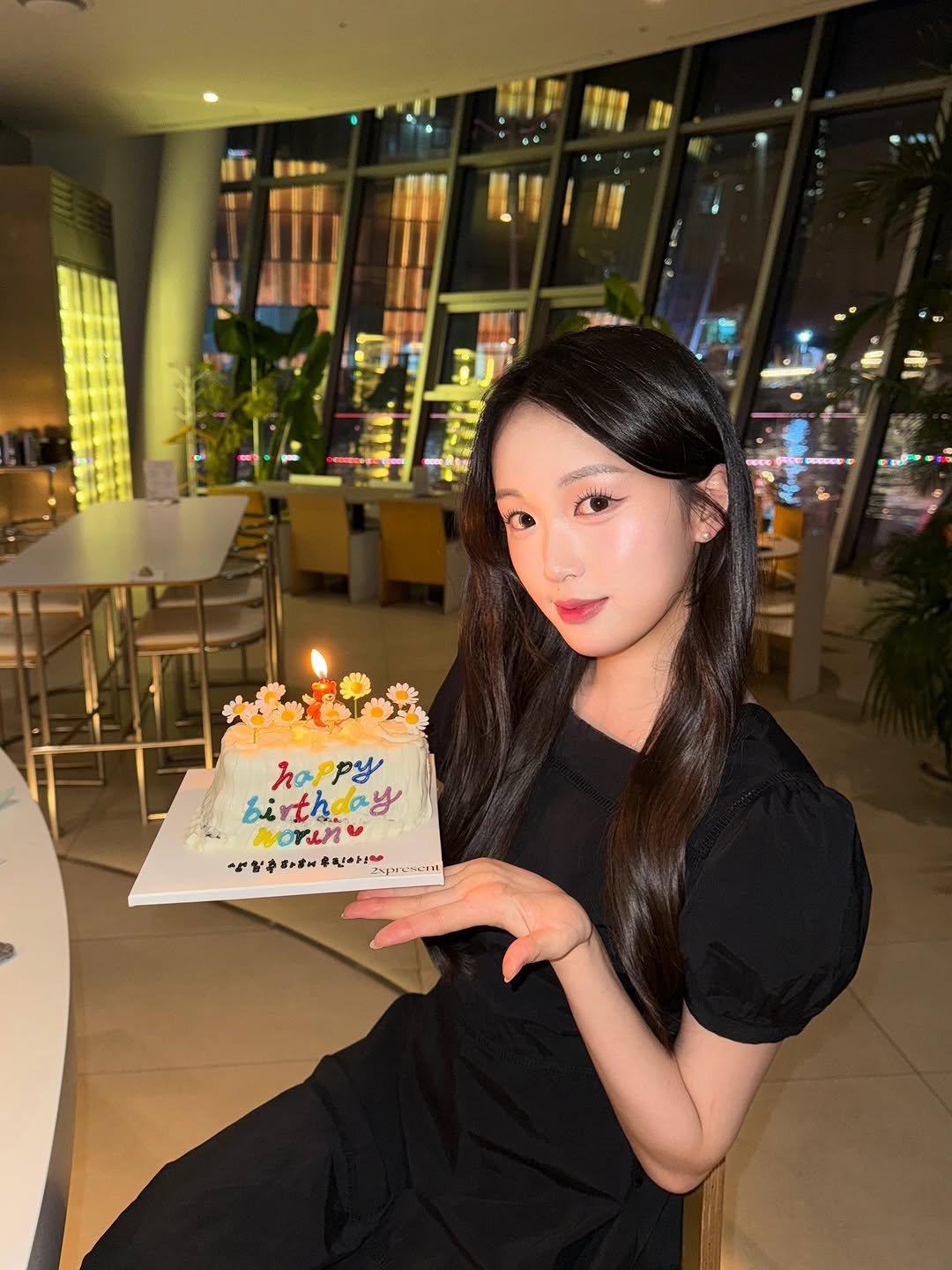 Photo by 우린 on December 31, 2025. May be an image of one or more people, hair, candle and text.