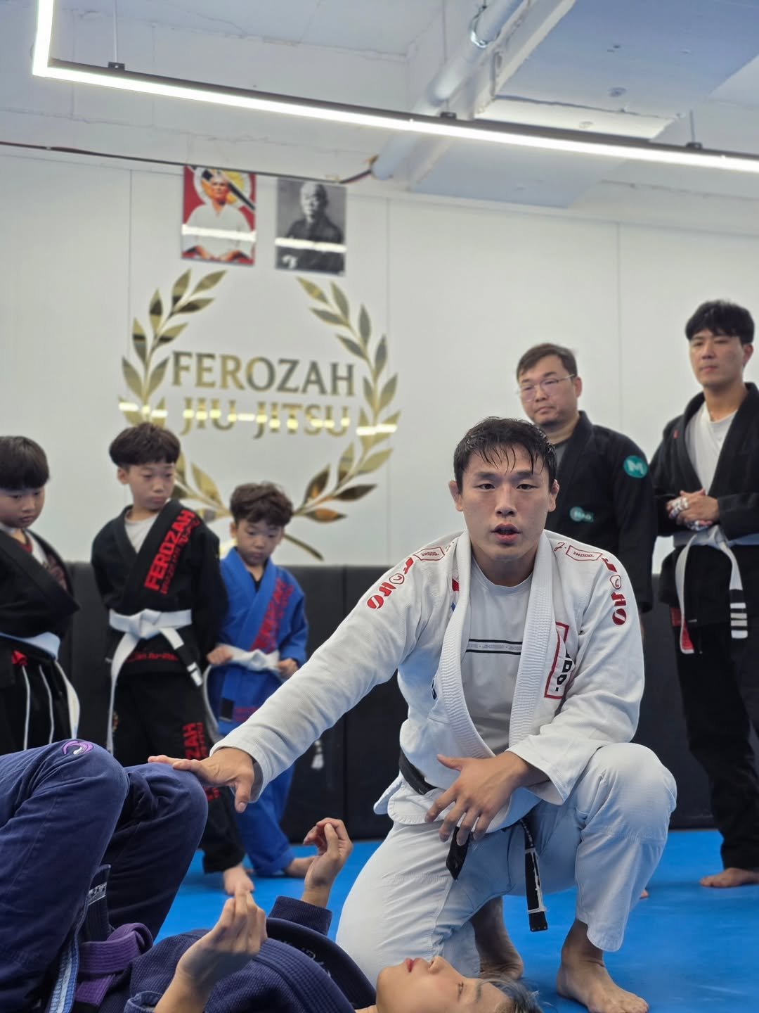 Photo by 조원희(JO.WONHEE) on September 27, 2025. May be an image of 5 people, people performing martial arts, belt and text.