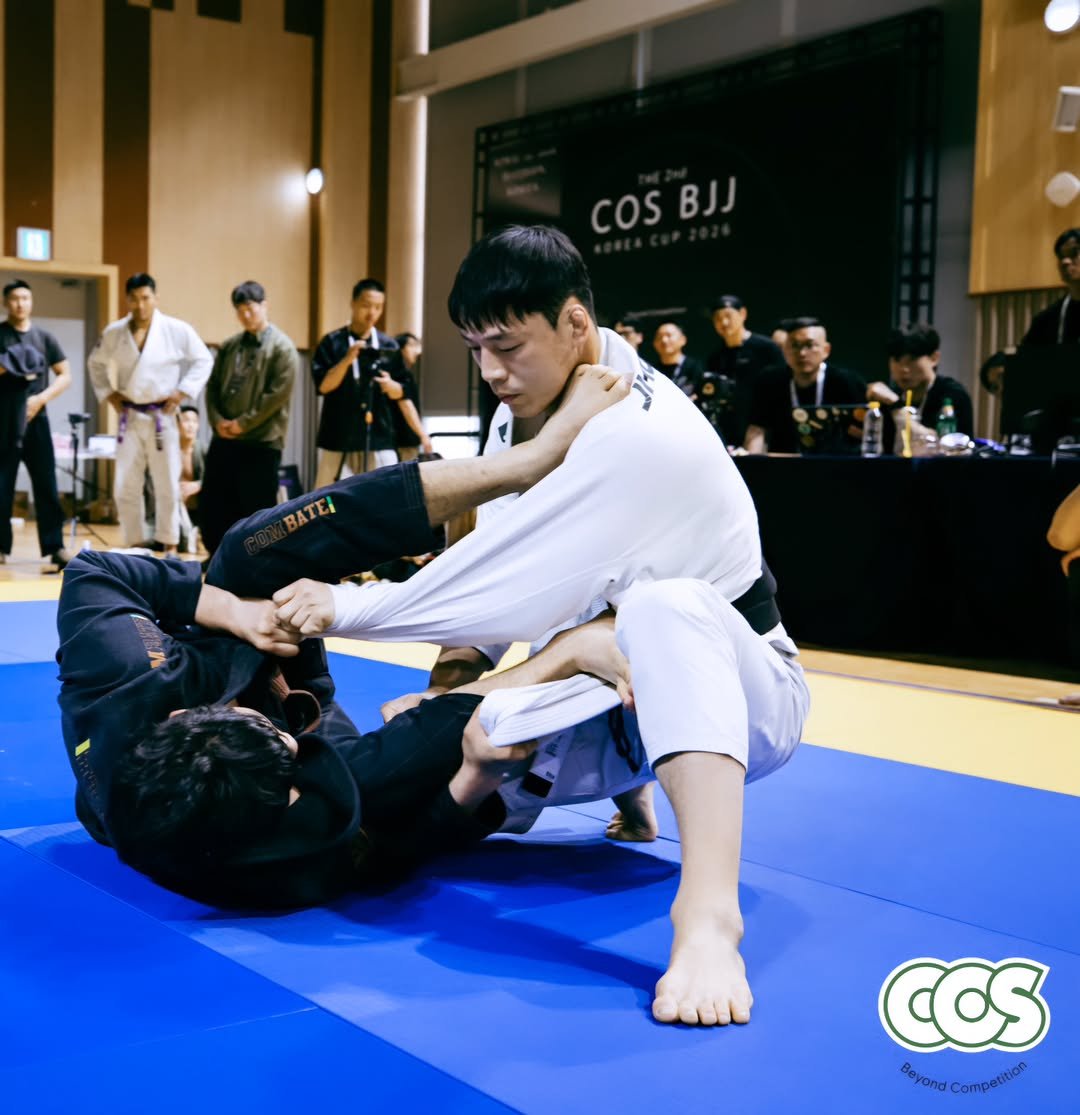 Photo shared by 조원희(JO.WONHEE) on April 27, 2026 tagging @jhood_official, @jiujitsukor, @bjj_izidor, @cos.koreacup, and @cos.or.kr. May be an image of martial arts, belt and text.