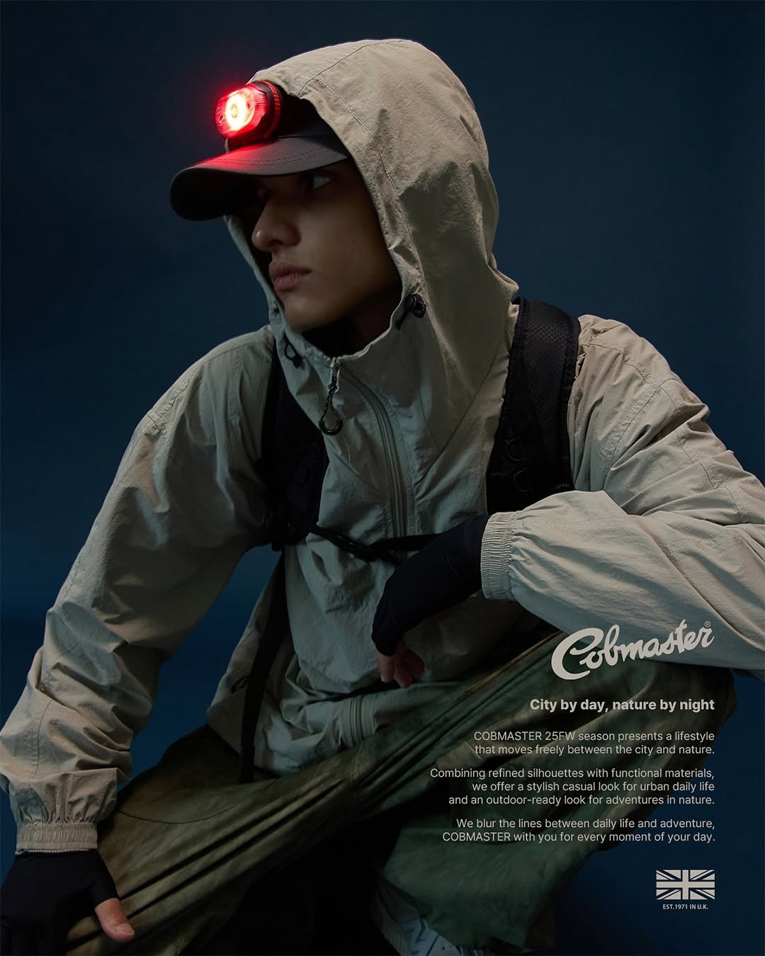 Photo by WONDERPLACE(원더플레이스) on September 02, 2025. May be an image of 1 person, duffle coat, costume, military uniform, raincoat, parka, magazine, outdoors and text.
