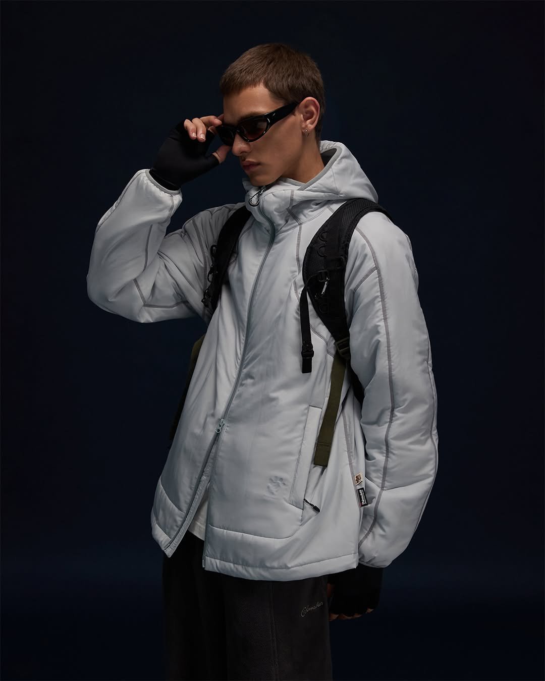 Photo by WONDERPLACE(원더플레이스) on September 29, 2025. May be an image of 1 person, duffle coat, goosedown coat, flight jacket, sportswear, parka, fleece and text.