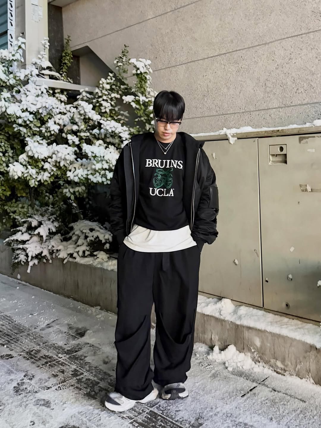 Photo shared by 김상우 on January 26, 2026 tagging @ucla_lifestyle_korea. May be an image of duffle coat, parka, sportswear, fleece, sweatpants and text that says 'BRUINS UCLA'.