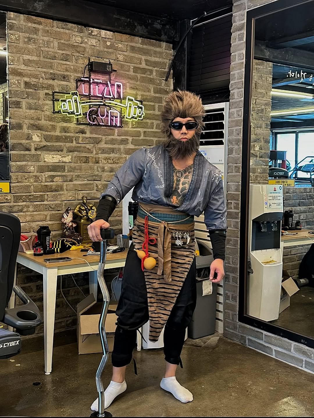 Photo by 우비 on October 30, 2025. May be an image of axe, tambourine, sword, kilt, eye patch, portable cassette player, hammer, glasses and text.