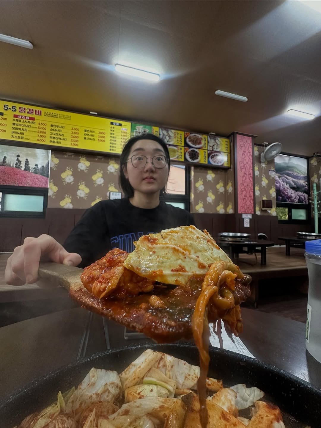 Photo by 우비 on October 01, 2025. May be an image of 1 person, ramen and text.