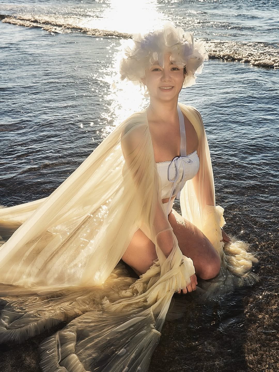 Photo shared by 나래 박 on August 01, 2025 tagging @aj_studiolot6. May be an image of 1 person, makeup, headdress, gown and text.