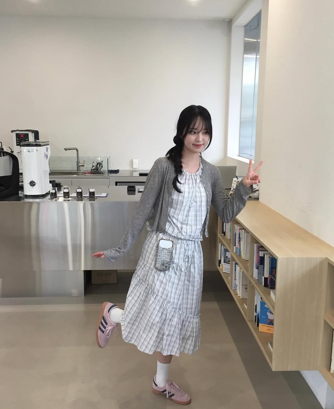 Photo shared by 민지 on July 29, 2025 tagging @enzoblues, @objekt.kr, @overdueflair, and @allof_allof. May be an image of 1 person, sleepwear, robe, bath robe, cornflower and text.