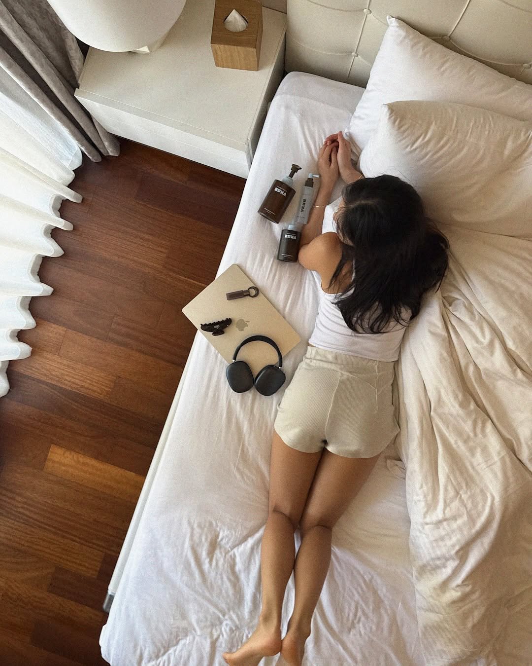 Photo shared by 우나스 woonas on September 17, 2025 tagging @brka.official. May be an image of sleepwear, phone, bed, headboard, mattress, bedroom and text.