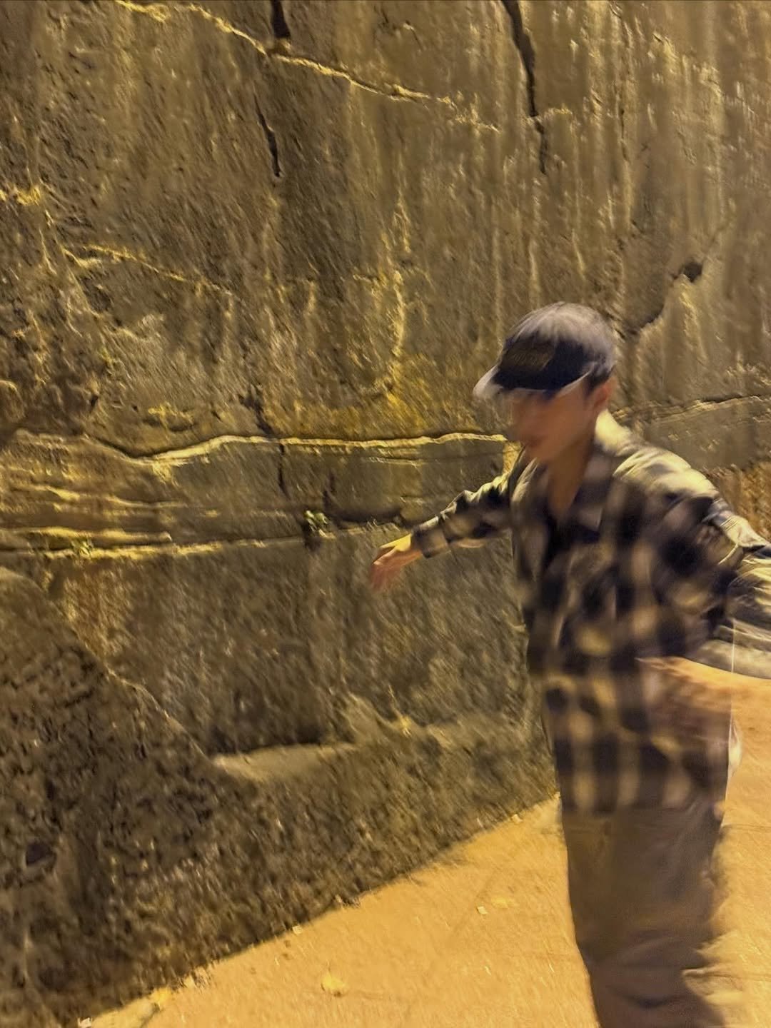 Photo shared by woodeoki on March 10, 2026 tagging @choi3an. May be an image of standing, the Western Wall, street and text.