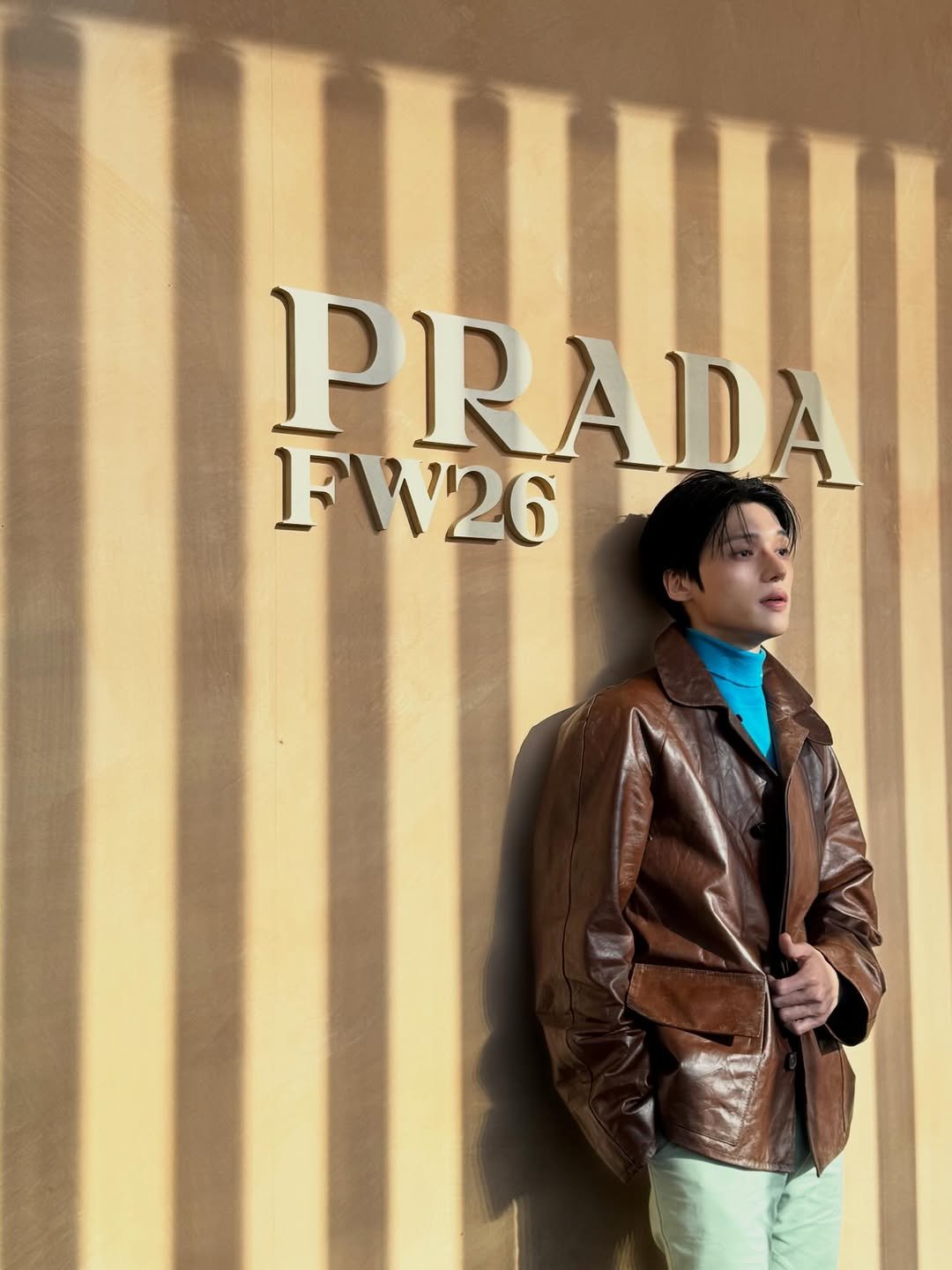 Photo by 우영 (WOOYOUNG) on February 26, 2026. May be an image of overcoat, duffle coat, jacket and text that says 'PRADA 1W26'.