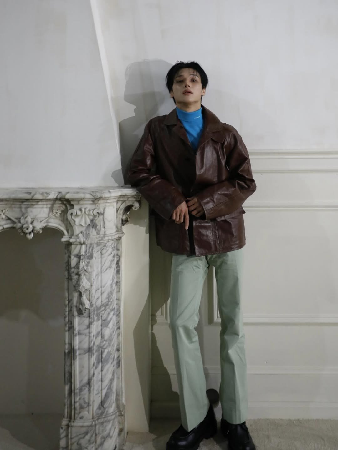 Photo by 우영 (WOOYOUNG) on February 27, 2026. May be an image of duffle coat, overcoat, wingtip shoes and text.