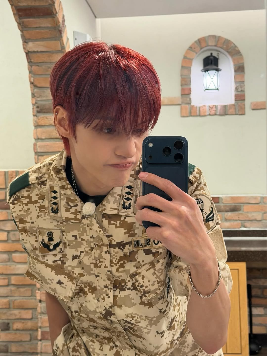Photo by 우영 (WOOYOUNG) on March 19, 2026. May be a selfie of one or more people, bangs, military uniform, bolo tie and text.