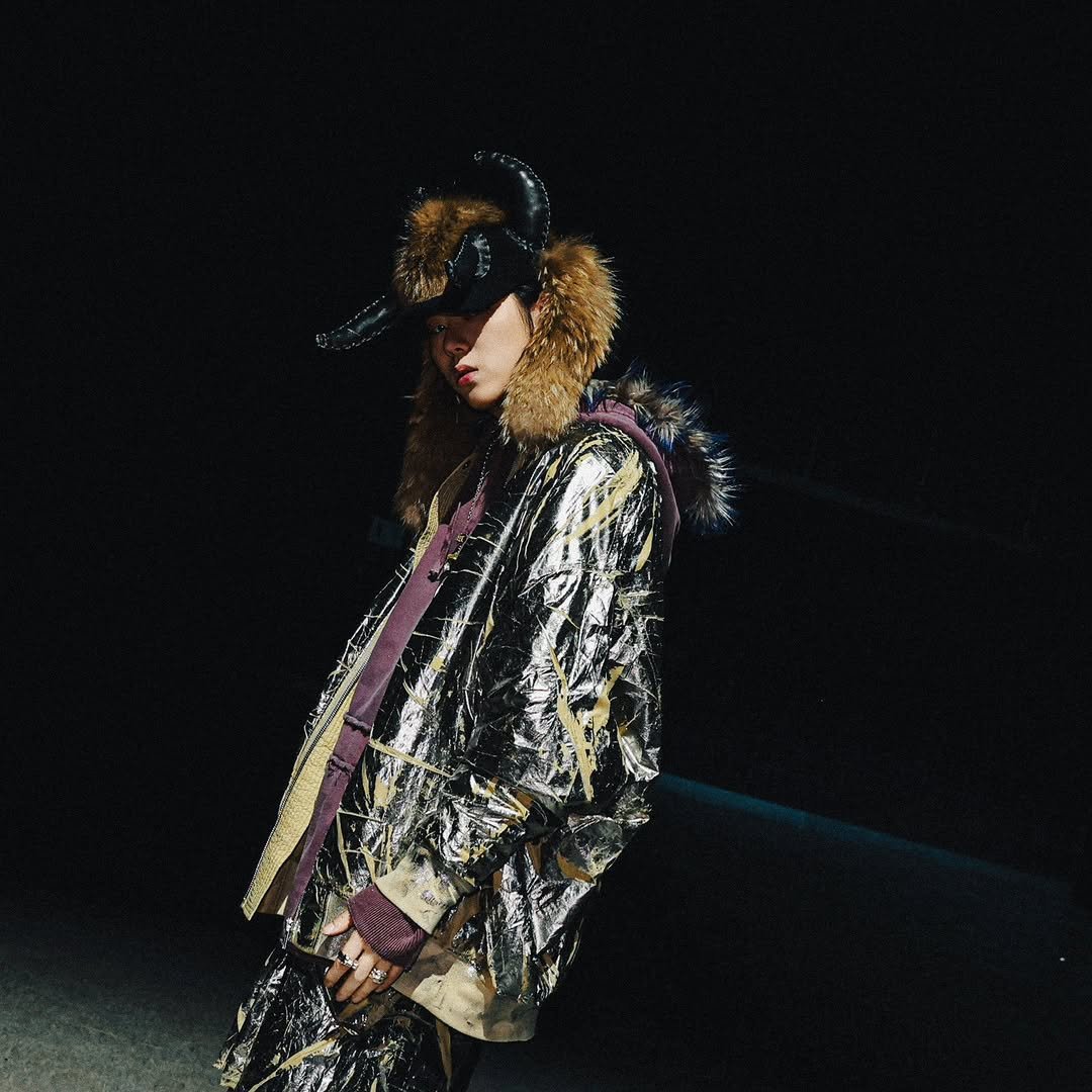 Photo by 우지호/ZICO on January 16, 2026. May be an image of one or more people, makeup and overcoat.