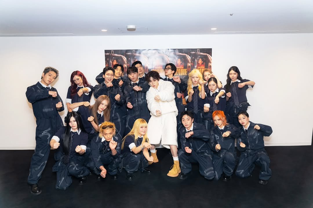 Photo by 우지호/ZICO on February 16, 2026. May be an image of one or more people, makeup, jumpsuit and text.