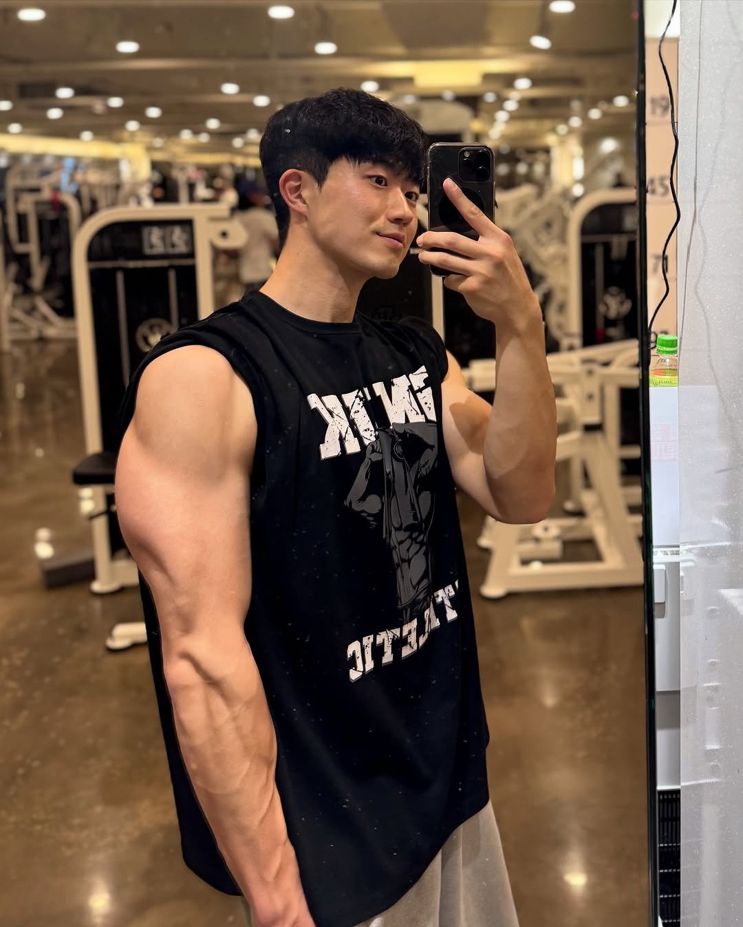 Photo by 민규 in Seoul, Korea. May be an image of 1 person, biceps, body building and text.