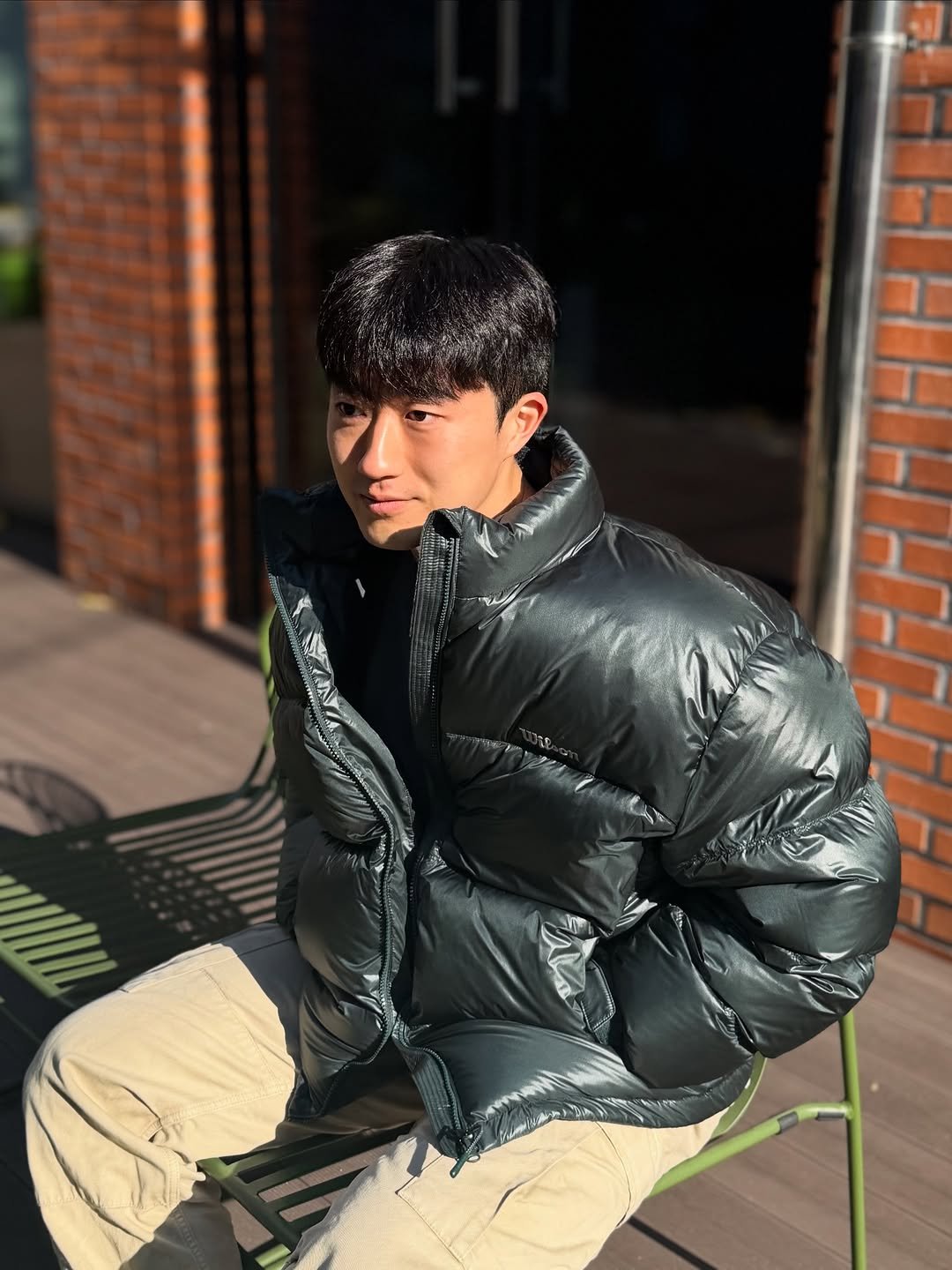 Photo shared by 민규 on November 12, 2025 tagging @wilson, and @wilsonkorea. May be an image of sherpa coat, duffle coat, goosedown coat, parka, flight jacket, fleece and text.