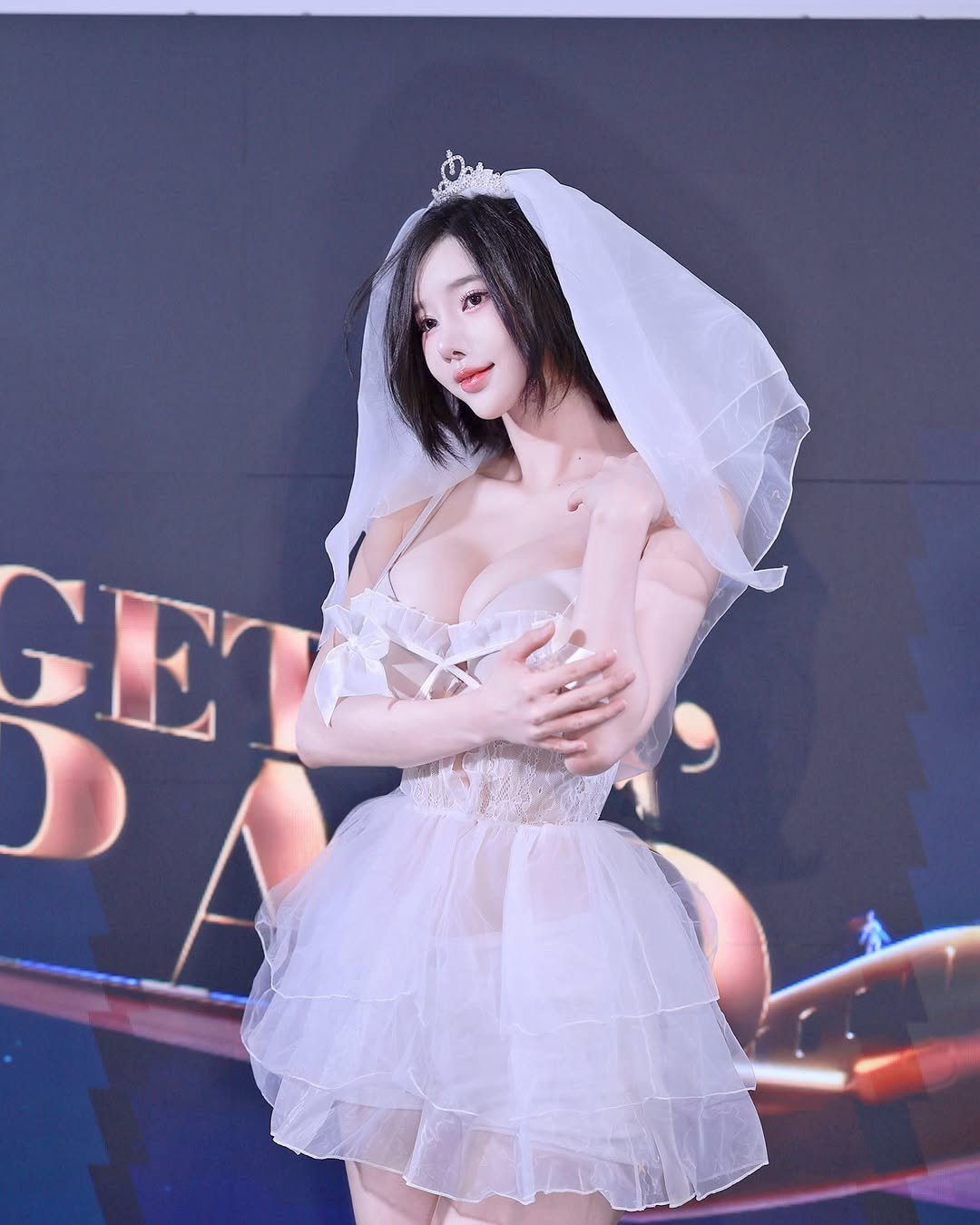 Photo by Song Joo A on July 09, 2025. May be an image of 1 person, hair, dress, bra, chemise and text.