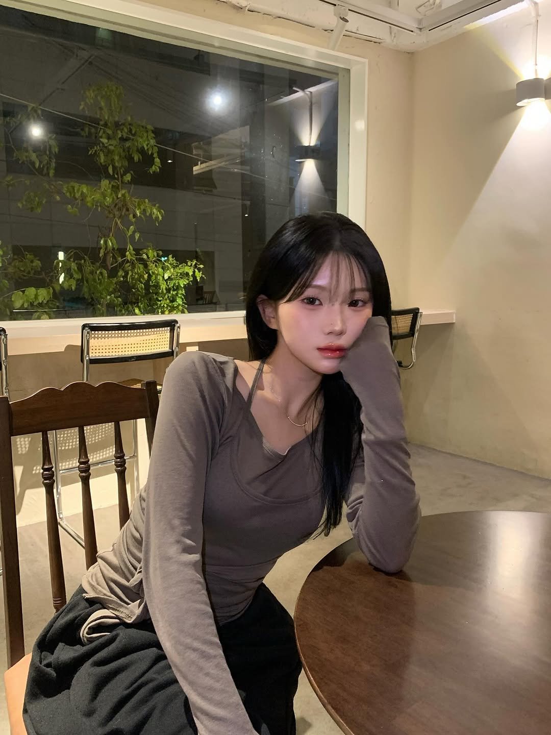 Photo by 강다인 on November 14, 2025. May be an image of one or more people, hair, top, dress and text.