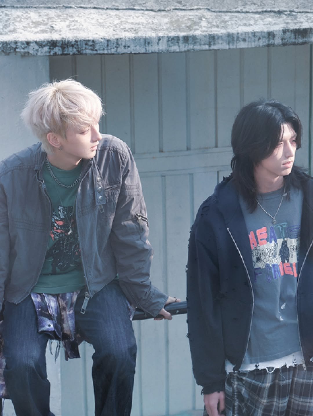 Photo shared by Xdinary Heroes on April 02, 2026 tagging @jypentertainment. May be an image of one or more people, bangs, bolo tie, top and text.