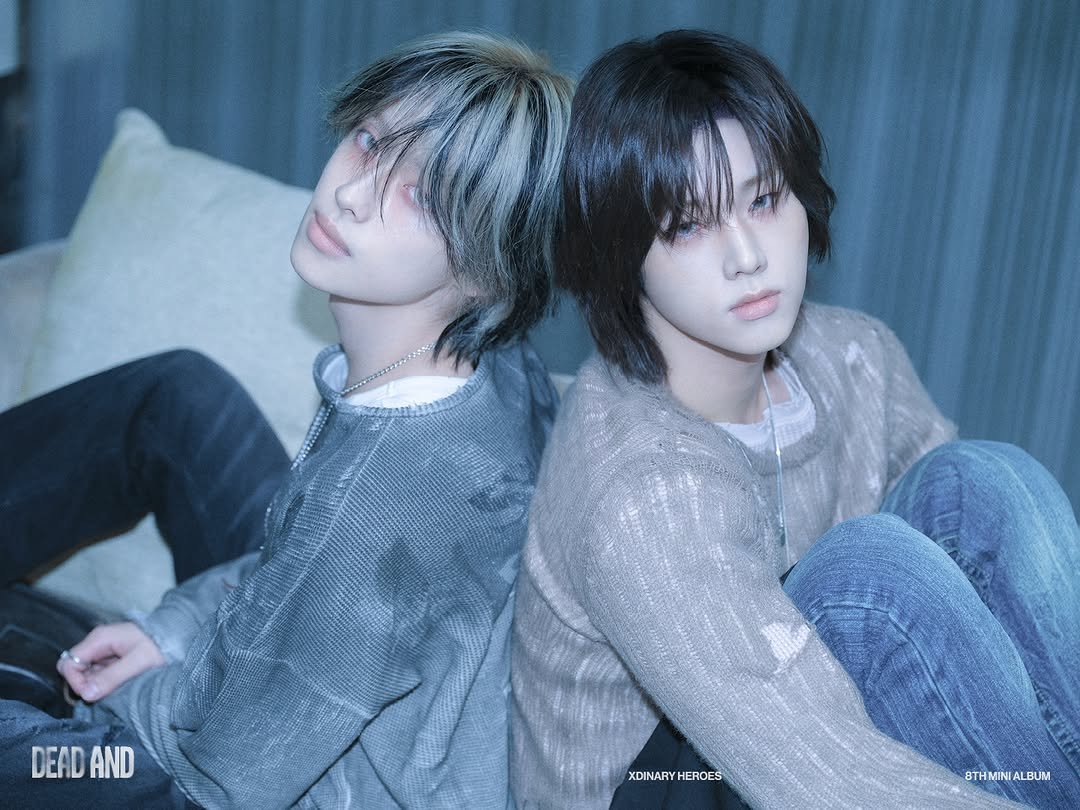Photo shared by Xdinary Heroes on April 02, 2026 tagging @jypentertainment. May be an image of one or more people, bangs and text that says 'DEAD DEADAND AND XDINARYHEROES HEROES XDINARY 8THMINIALBUM 8THMIN ALBUM'.