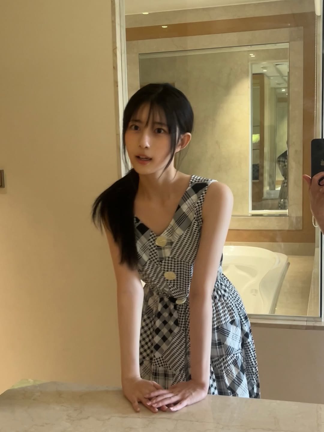 Photo by 이자민 on August 14, 2025. May be an image of 1 person, hair, mirror, dress, sundress and text.