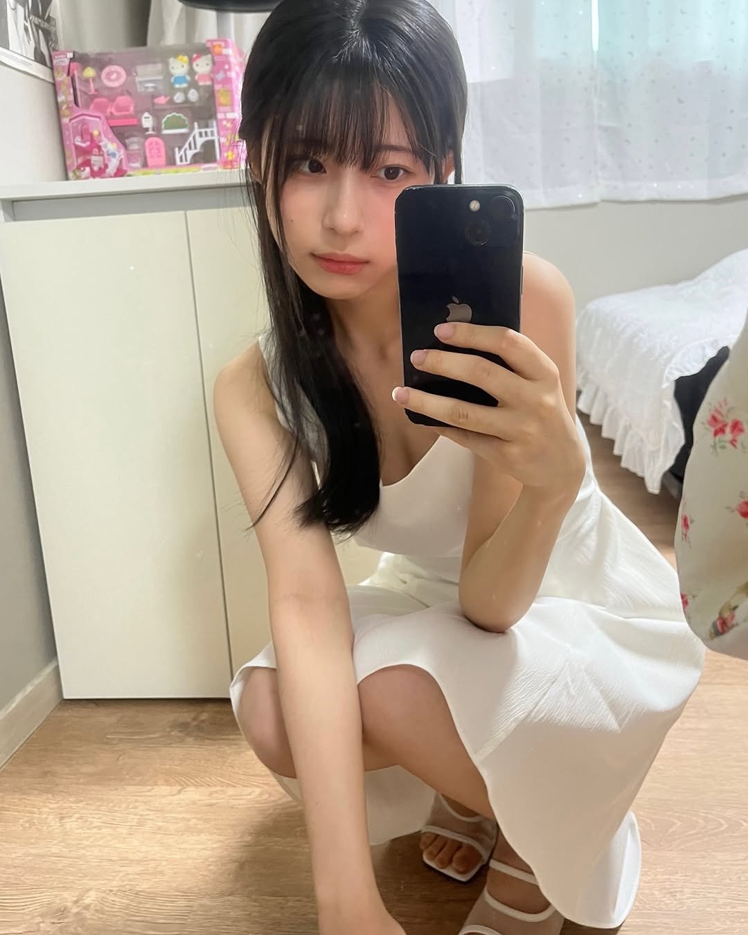 Photo shared by 이자민 on April 27, 2025 tagging @afterhours.co.kr. May be an image of 1 person, hair, slip, dress and text.