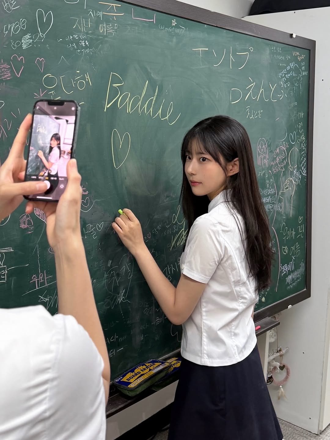Photo by 이자민 on June 21, 2025. May be an image of 2 people, hair, poster and text.