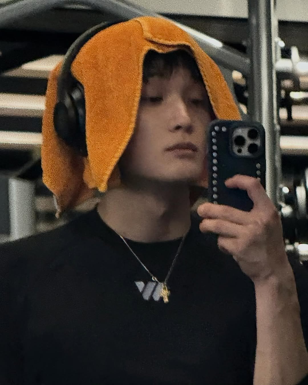 Photo by xikers(싸이커스) on March 30, 2026. May be an image of one or more people, biceps, phone, sweatpants and text.