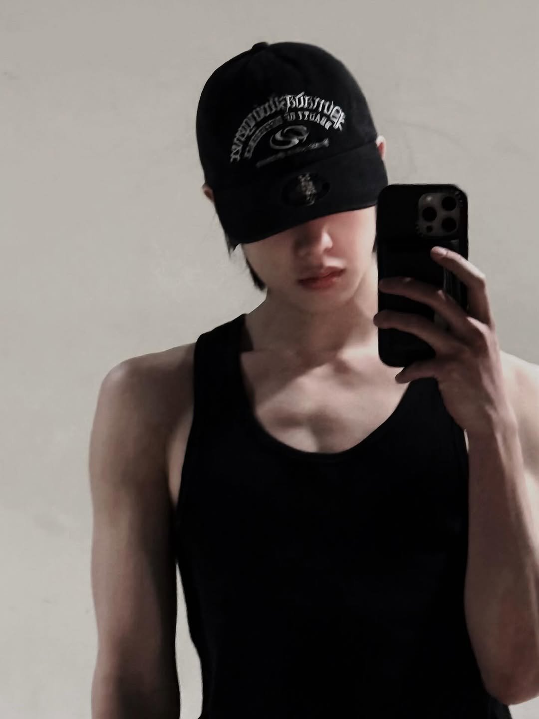 Photo by xikers(싸이커스) on March 29, 2026. May be an image of one or more people, biceps, hat, tanktop and text.