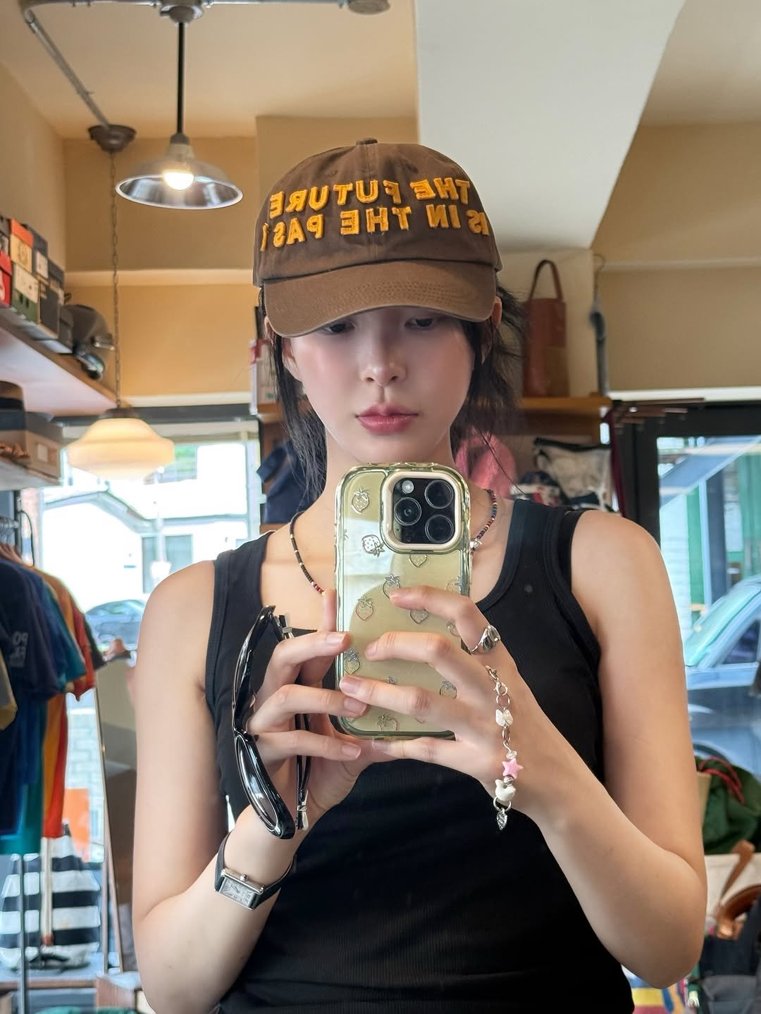 Photo by 신수현 on September 09, 2025. May be an image of 2 people, hat, hat shop and text.