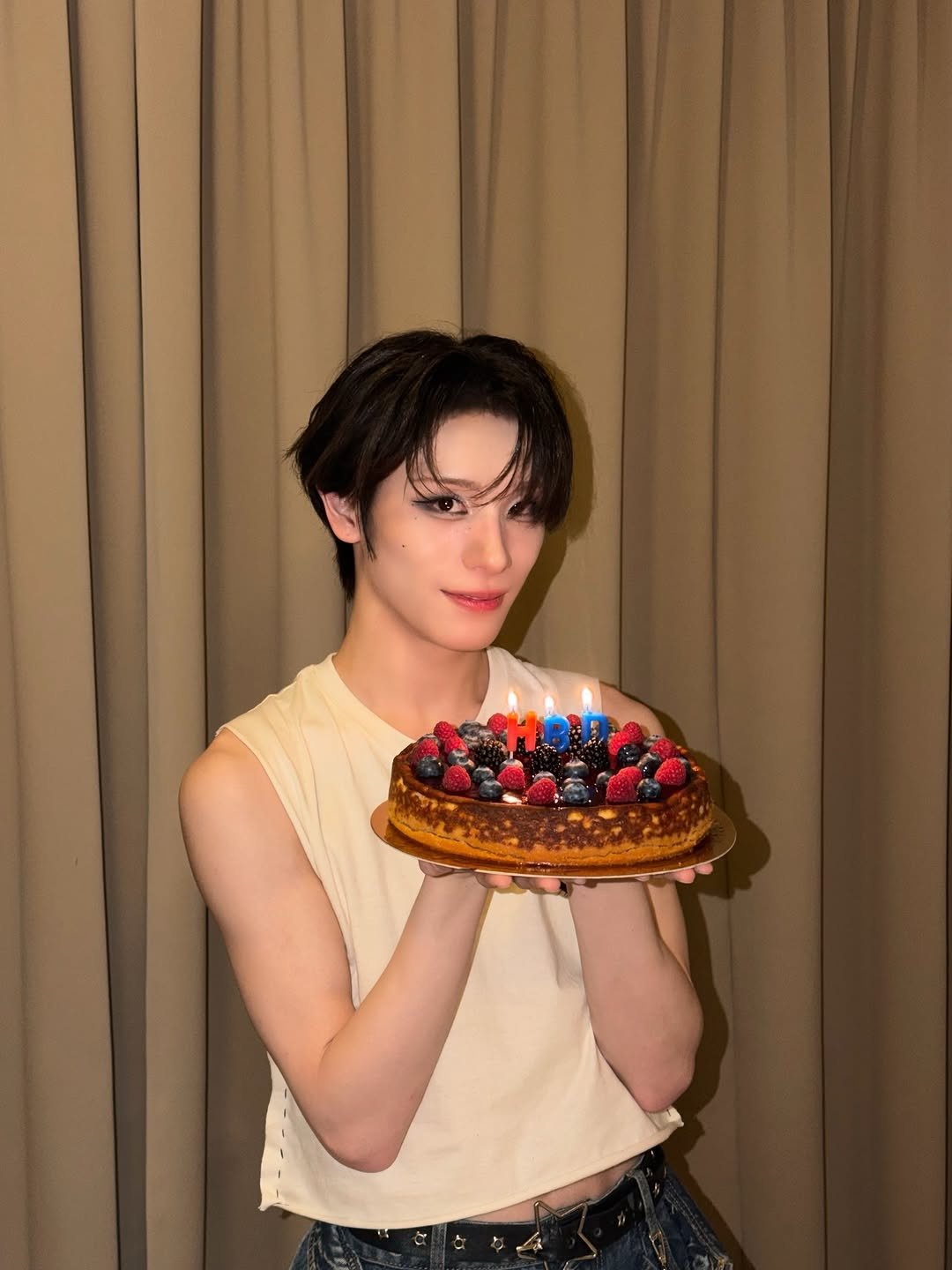 Photo by XLOV on February 18, 2026. May be an image of one or more people, bangs, candle holder, candle, bolo tie and text.